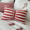 Poduszka w czerwono białe pasy świąeczna laski cukrowe, poduszka kokarda